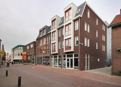 Winkel met 12 appartementen in Barneveld